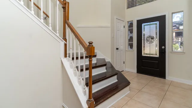 a view of entryway with a front door