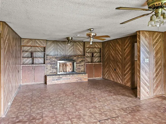 a kitchen with stainless steel appliances granite countertop a sink and a cabinets