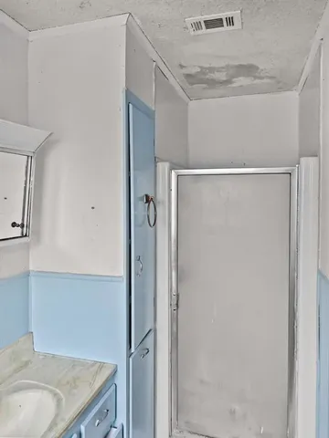 a view of a hallway with a window