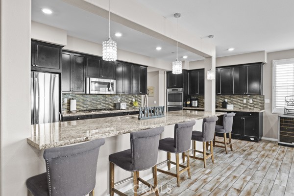 23347 Crystal Way Wildomar, CA 92595 - Photo 8 of 109 View into Kitchen and Island