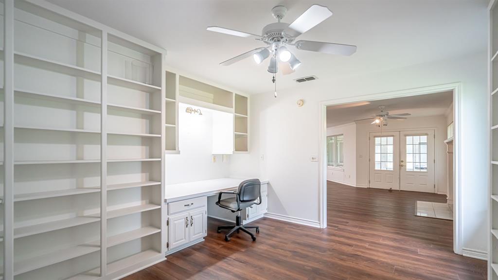 111 Scenic Drive Dublin, TX 76446 - Photo 14 of 40 a view of a livingroom with furniture and a chandelier