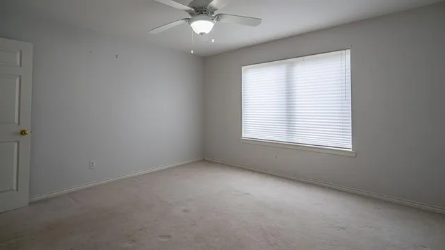 a living room with a large window