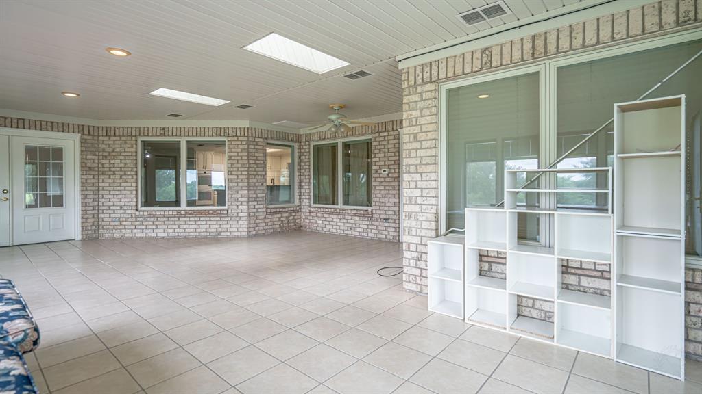 111 Scenic Drive Dublin, TX 76446 - Photo 32 of 40 a view of a room with shelves