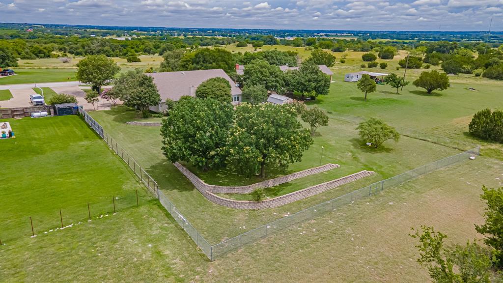 111 Scenic Drive Dublin, TX 76446 - Photo 38 of 40 a view of a swimming pool with a yard