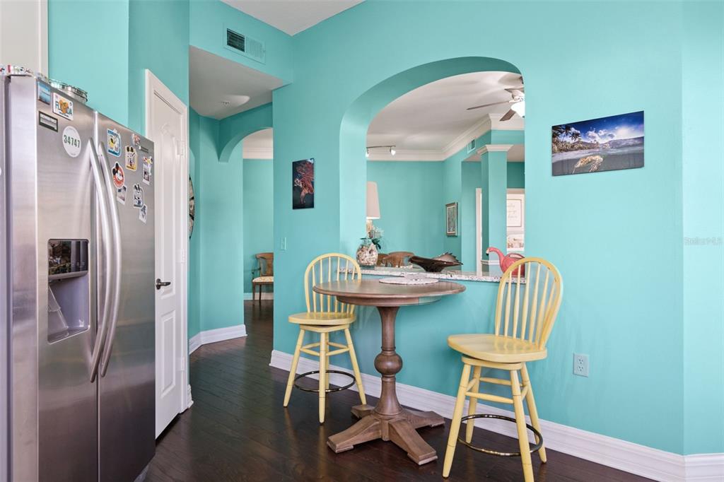 515 Mirasol Circle, Unit 302 Celebration, FL 34747 - Photo 13 of 60 a view of a dining room with furniture