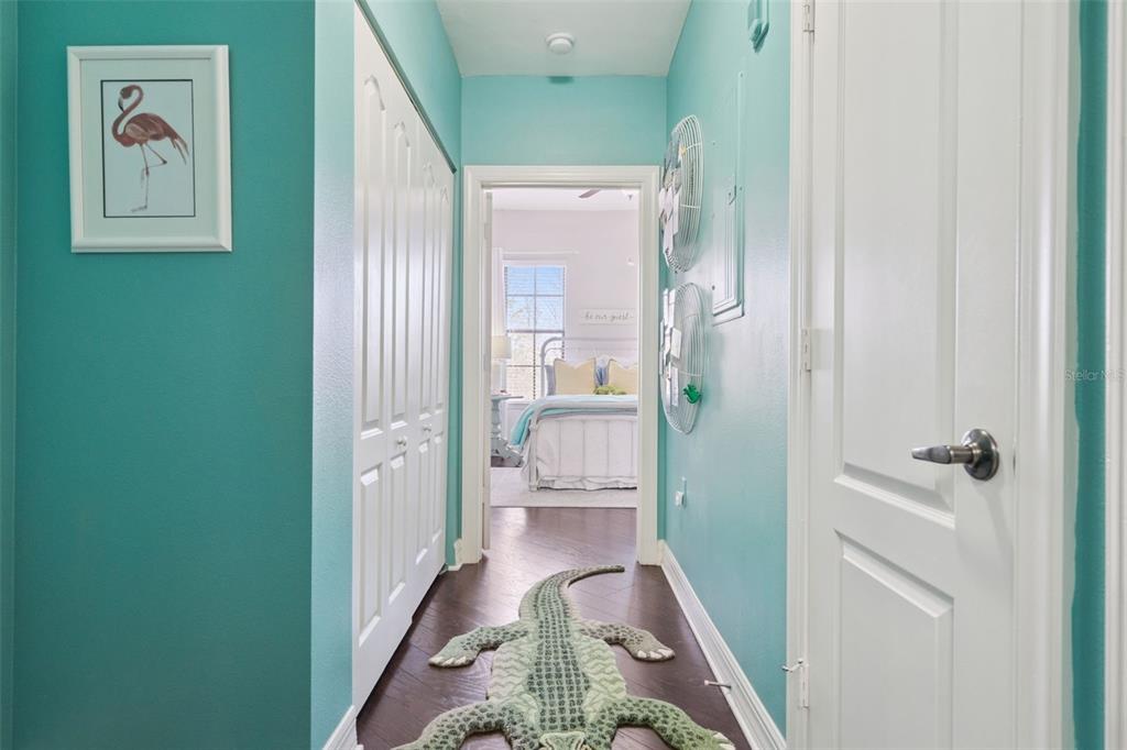 515 Mirasol Circle, Unit 302 Celebration, FL 34747 - Photo 21 of 60 a view of a hallway with a livingroom and a bathroom with sink