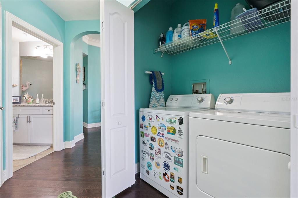 515 Mirasol Circle, Unit 302 Celebration, FL 34747 - Photo 38 of 60 a utility room with dryer and washer