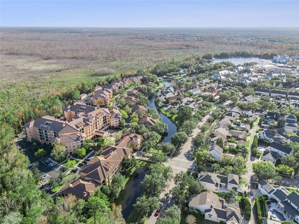 515 Mirasol Circle, Unit 302 Celebration, FL 34747 - Photo 56 of 60 an aerial view of multiple house