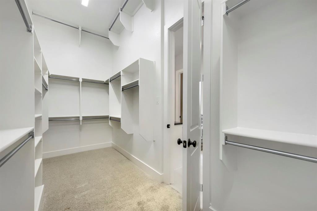 799 Mandrake Road Haslet, TX 76052 - Photo 21 of 27 a view of walk in closet with empty racks