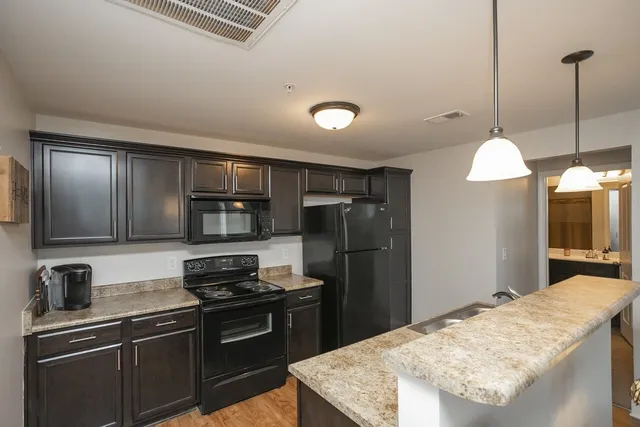 a view of storage and utility room with washer and dryer