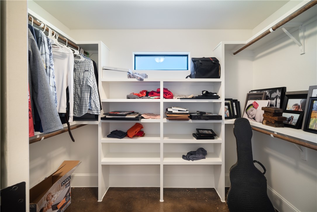 315 Bluestem Cove Georgetown, TX 78633 - Photo 16 of 35 a view of a kitchen with fridge and workspace