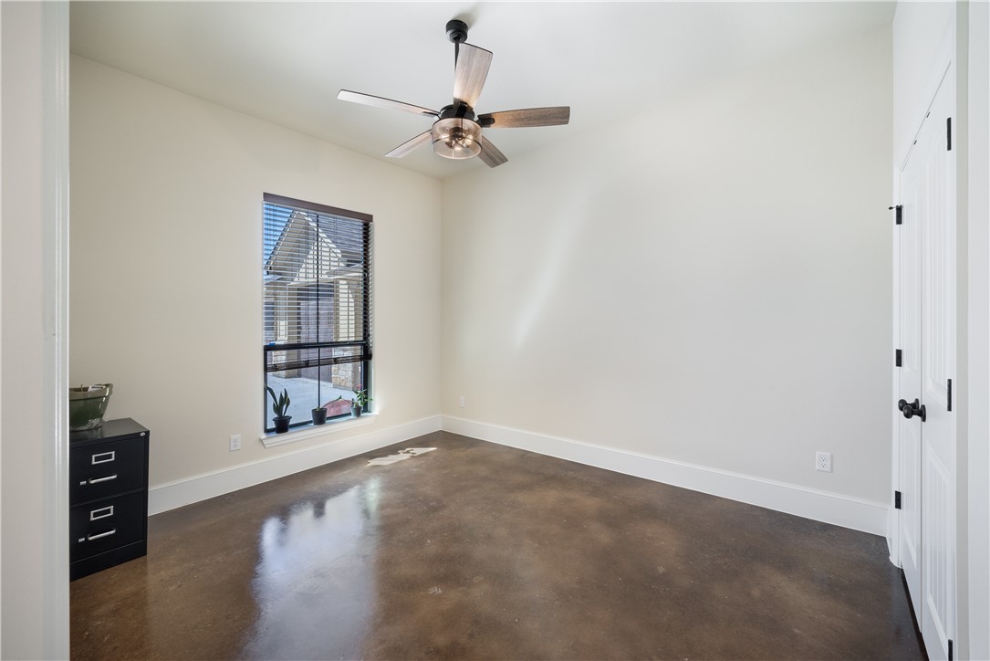 315 Bluestem Cove Georgetown, TX 78633 - Photo 19 of 35 an empty room with windows and fan