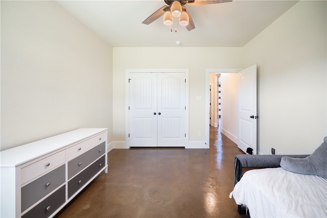 315 Bluestem Cove Georgetown, TX 78633 - Photo 24 of 35 a view of room with furniture and wooden floor