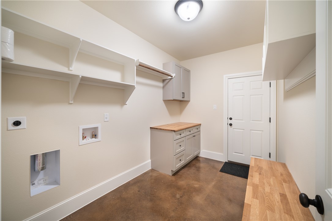 315 Bluestem Cove Georgetown, TX 78633 - Photo 26 of 35 a view of a room with cabinet and mirror