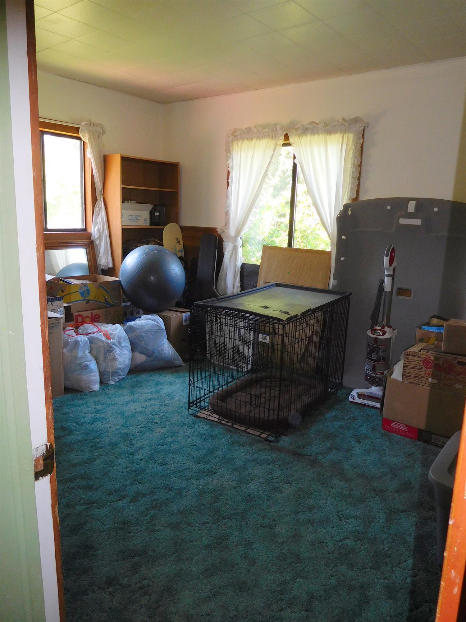 5685 Holland Loop Road Cave Junction, OR 97523 - Photo 12 of 18 2nd bedroom.