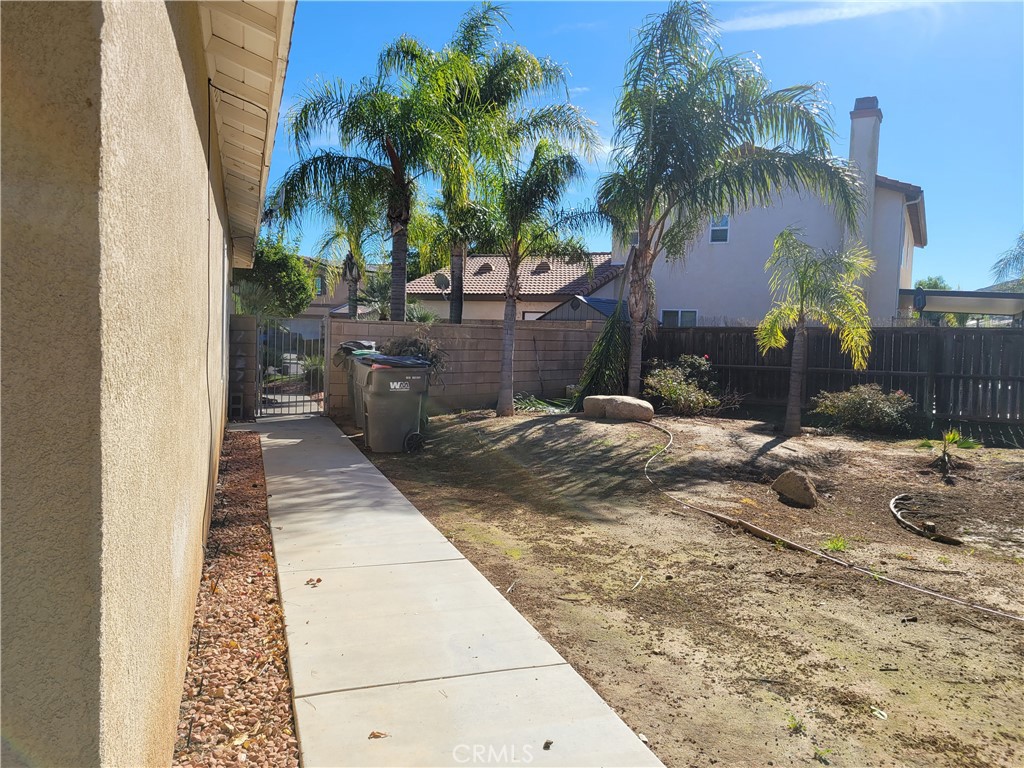 25540 Turfwood Street Menifee, CA 92585 - Photo 13 of 27 a view of a backyard