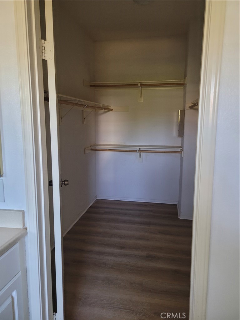 25540 Turfwood Street Menifee, CA 92585 - Photo 24 of 27 a view of an empty walk in closet