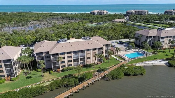 an aerial view of a house with a garden