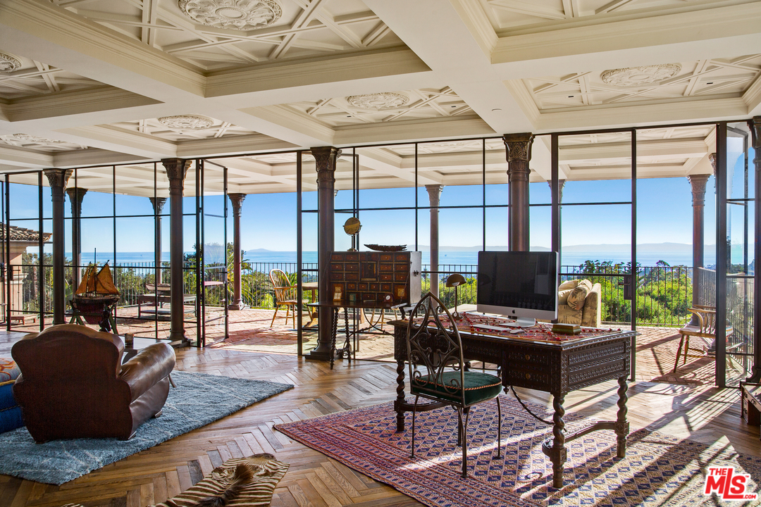 848 Hot Springs Road Santa Barbara, CA 93108 - Photo 15 of 26 a work room with furniture and wooden floor