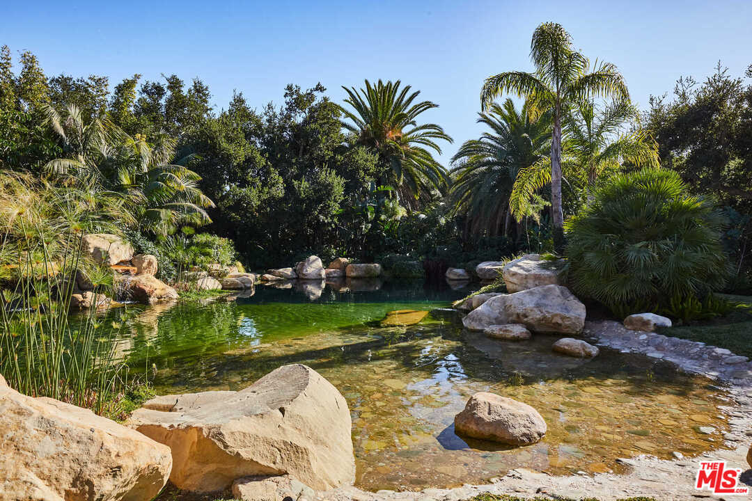 848 Hot Springs Road Santa Barbara, CA 93108 - Photo 22 of 26 a swimming pool with a yard