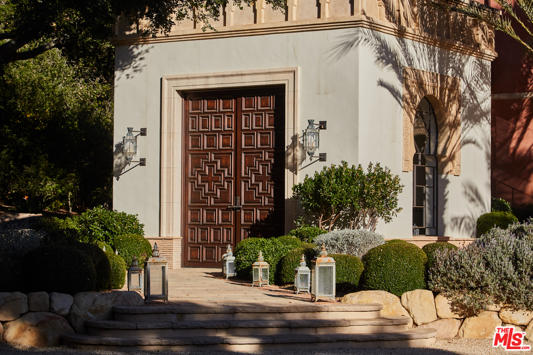 848 Hot Springs Road Santa Barbara, CA 93108 - Photo 4 of 26 a view of a house with a potted plant and a potted plant