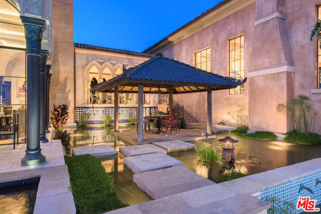 848 Hot Springs Road Santa Barbara, CA 93108 - Photo 8 of 26 a view of a patio with swimming pool table and chairs