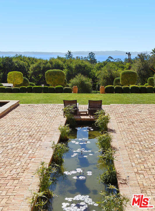 848 Hot Springs Road Santa Barbara, CA 93108 - Photo 9 of 26 an aerial view of a golf course with a lake view