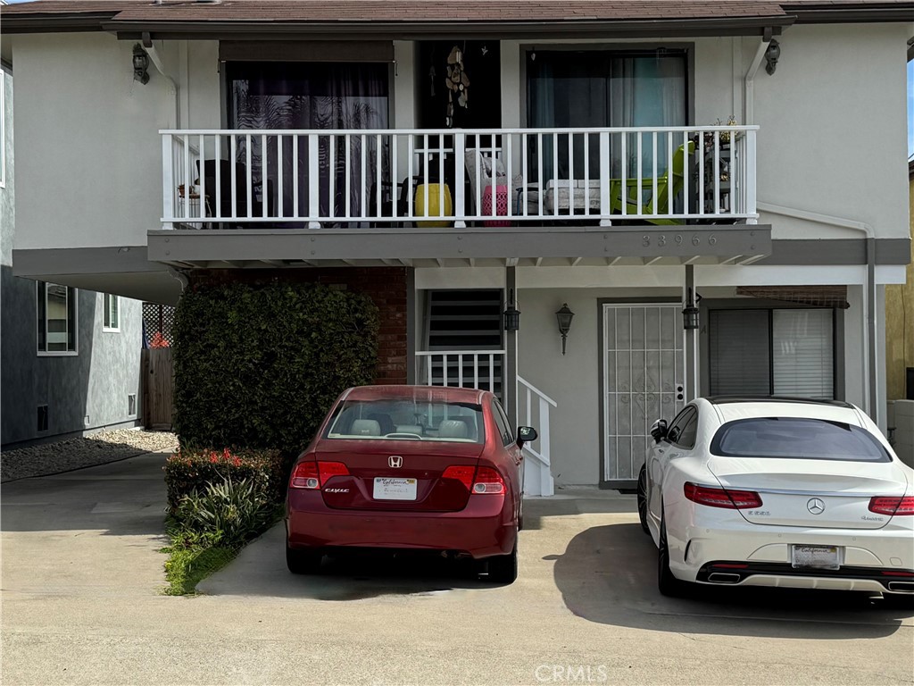 33966 Malaga Drive, Unit B Dana Point, CA 92629 - Photo 3 of 25 a car parked in front of a building