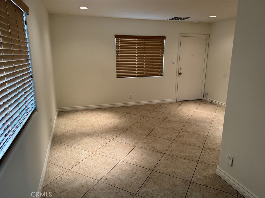 33966 Malaga Drive, Unit B Dana Point, CA 92629 - Photo 7 of 25 a view of an empty room with a window