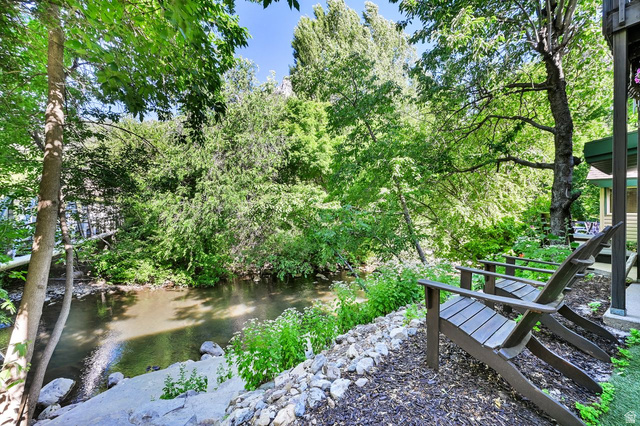 655 Ogden Canyon Road Ogden, UT 84401 - Photo 29 of 50 Waterside setting featuring a natural bank, mature trees, and lush vegetation
