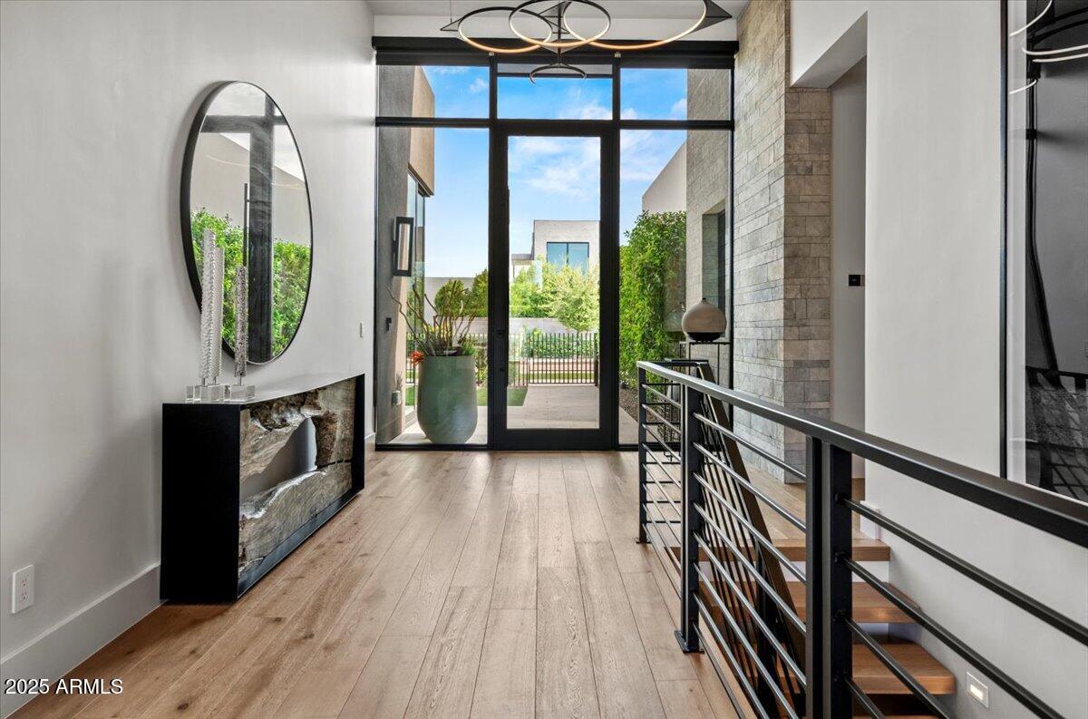 6802 East Joshua Tree Lane Paradise Valley, AZ 85253 - Photo 18 of 70 a view of a entryway door wooden floor and a living room
