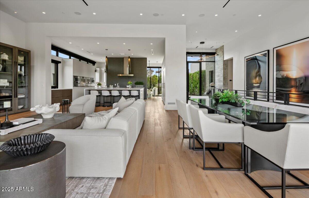 6802 East Joshua Tree Lane Paradise Valley, AZ 85253 - Photo 21 of 70 a living room with furniture and a table