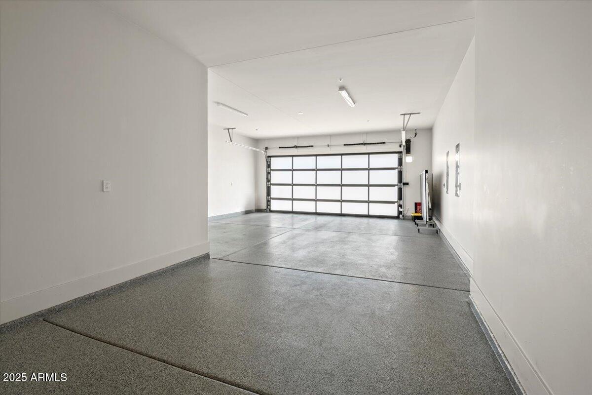 6802 East Joshua Tree Lane Paradise Valley, AZ 85253 - Photo 32 of 70 an empty room with windows and bathroom