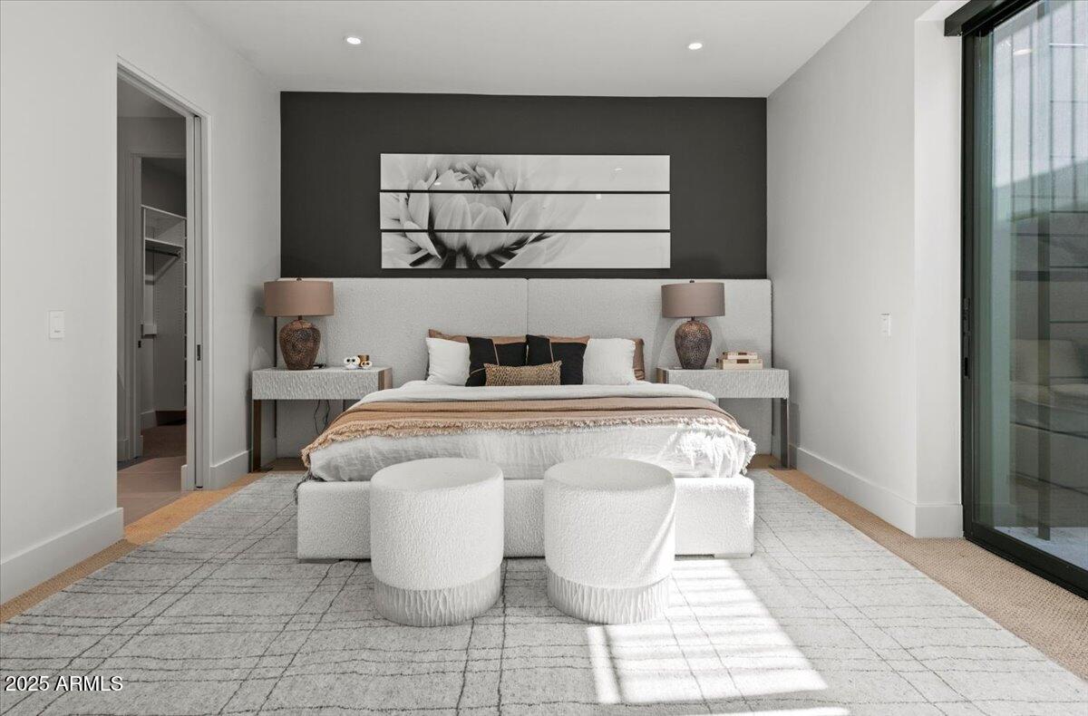 6802 East Joshua Tree Lane Paradise Valley, AZ 85253 - Photo 45 of 70 a bedroom with a bed and a night stand