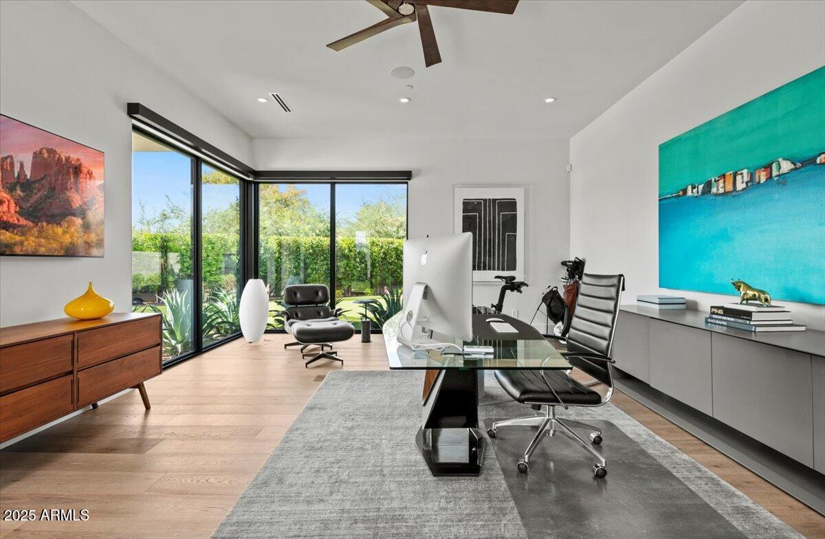 6802 East Joshua Tree Lane Paradise Valley, AZ 85253 - Photo 50 of 70 a work room with furniture and a floor to ceiling window