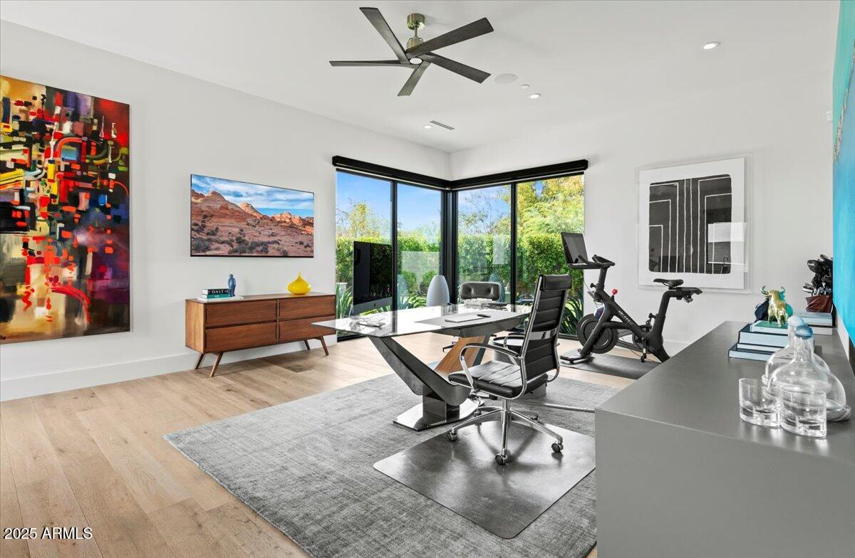 6802 East Joshua Tree Lane Paradise Valley, AZ 85253 - Photo 51 of 70 a living room with furniture and a floor to ceiling window