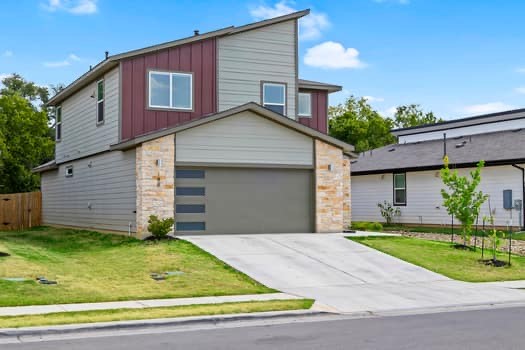 148 Shawi Pass Leander, TX 78641 - Photo 1 of 1 a view of a house with a yard and garage