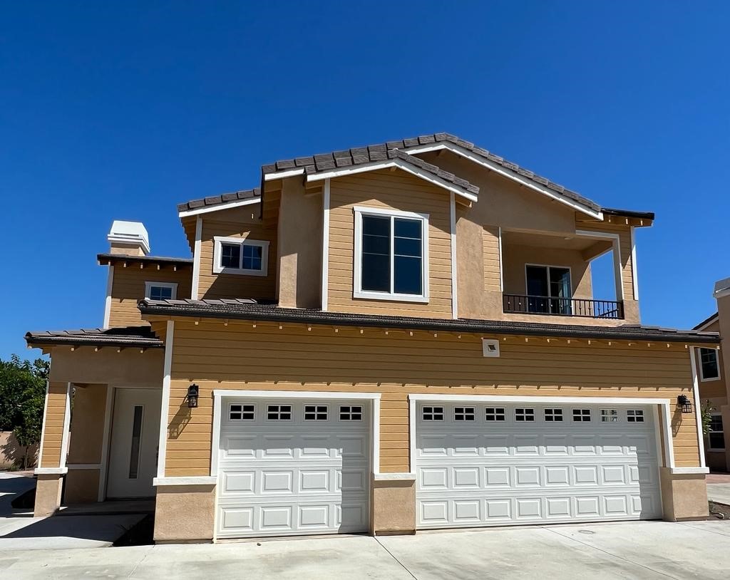 12046 Ranchito Street El Monte, CA 91732 - Photo 1 of 1 a front view of a house with a garage