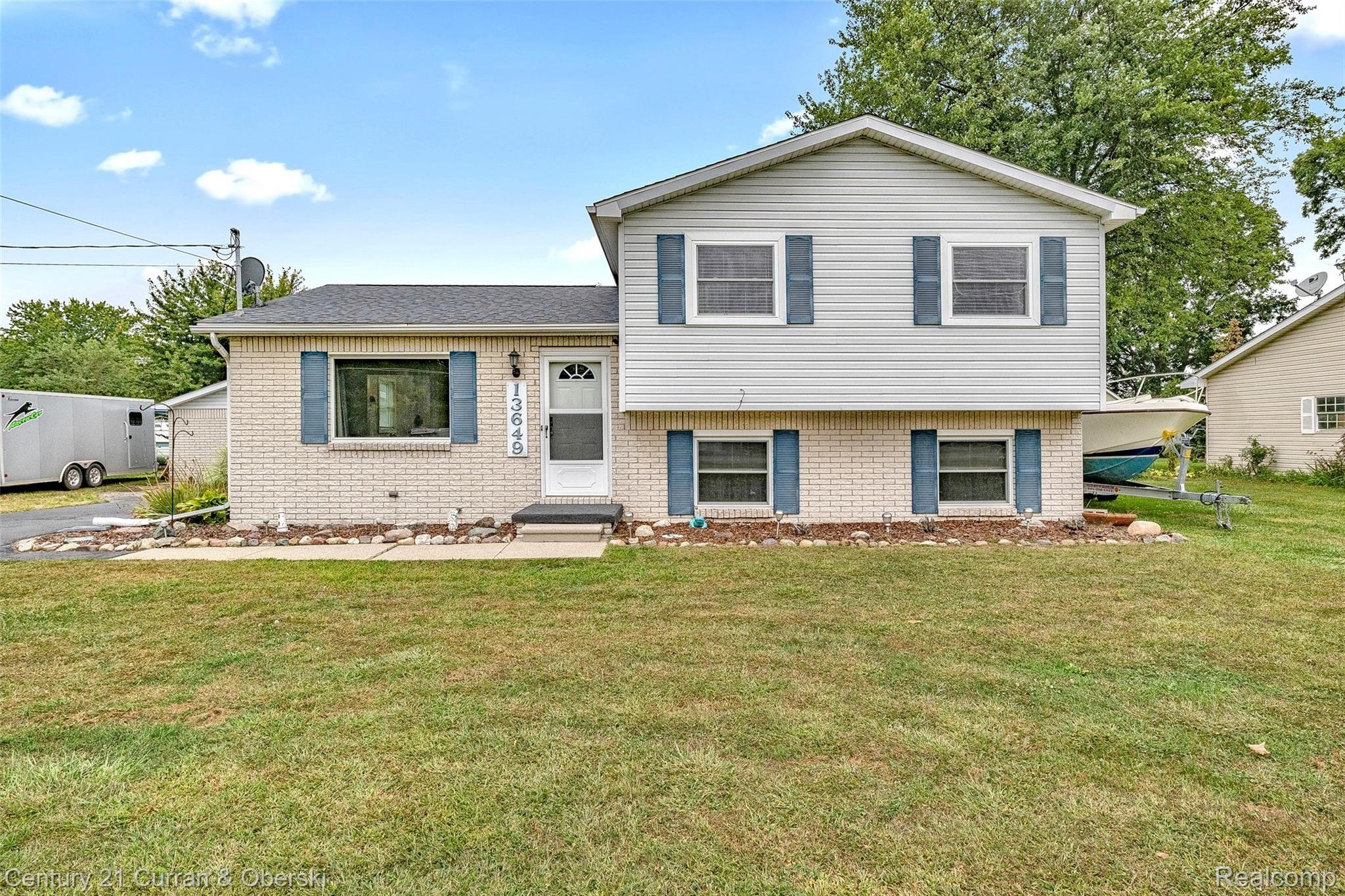 13649 Laplaisance Road Monroe, MI 48161 - Photo 1 of 22 Front of house 1.jpg