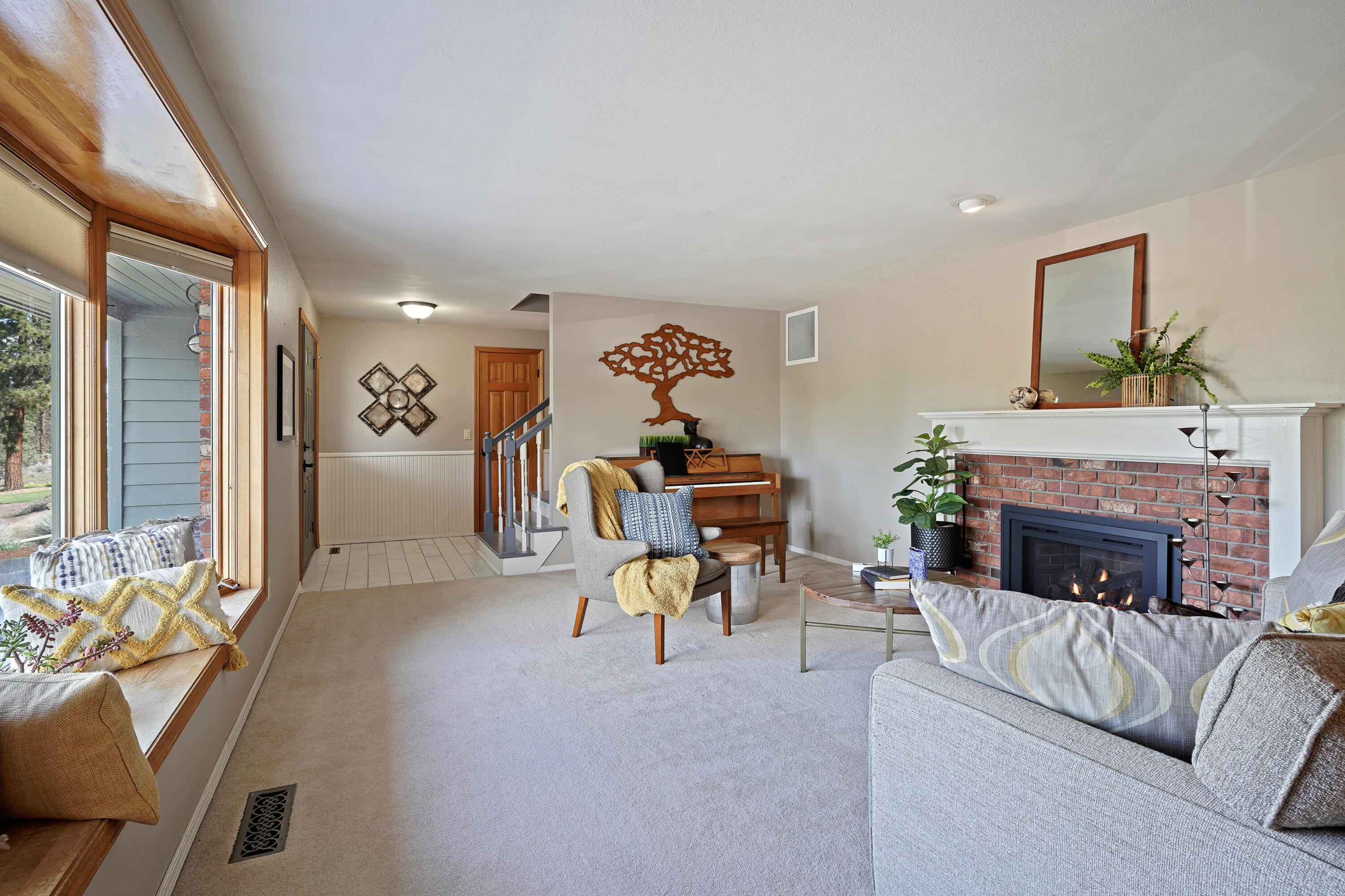 70030 Meadow View Road Sisters, OR 97759 - Photo 36 of 43 a living room with furniture and a fireplace