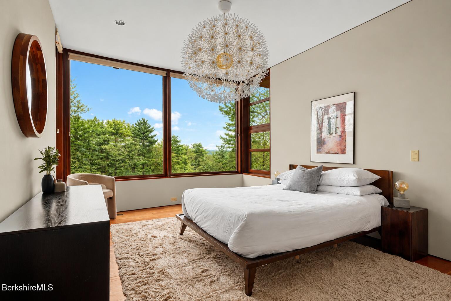 250 Long Pond Road Great Barrington, MA 01230 - Photo 36 of 56 a bedroom with a large bed and a window