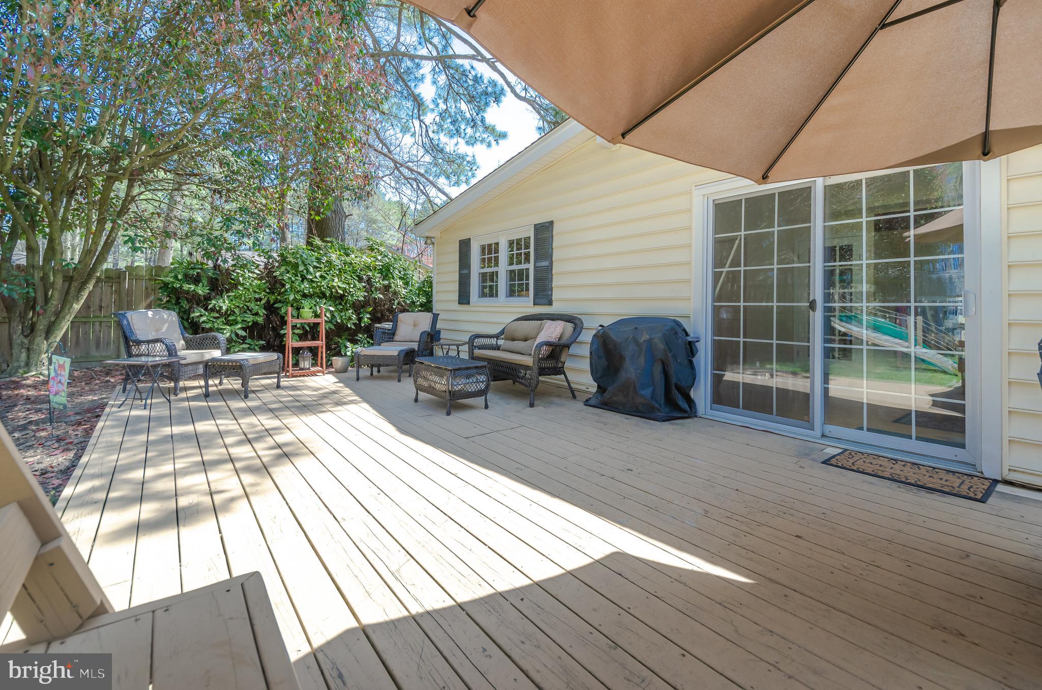 137 Worcester Road Stevensville, MD 21666 - Photo 25 of 53 Slider to deck & fenced yard