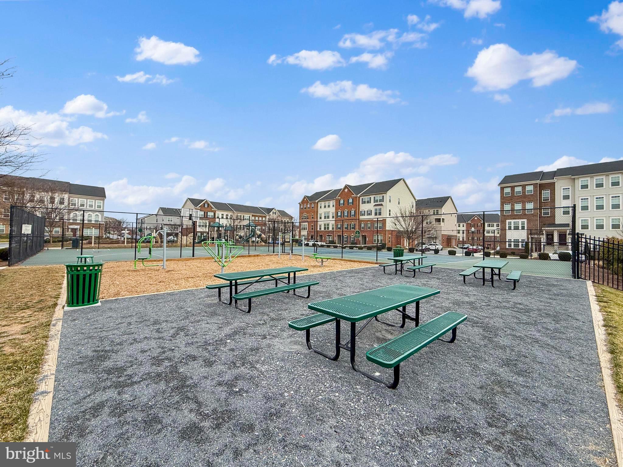 5936 Forum Square Frederick, MD 21703 - Photo 34 of 38 a swimming pool with outdoor seating and city view