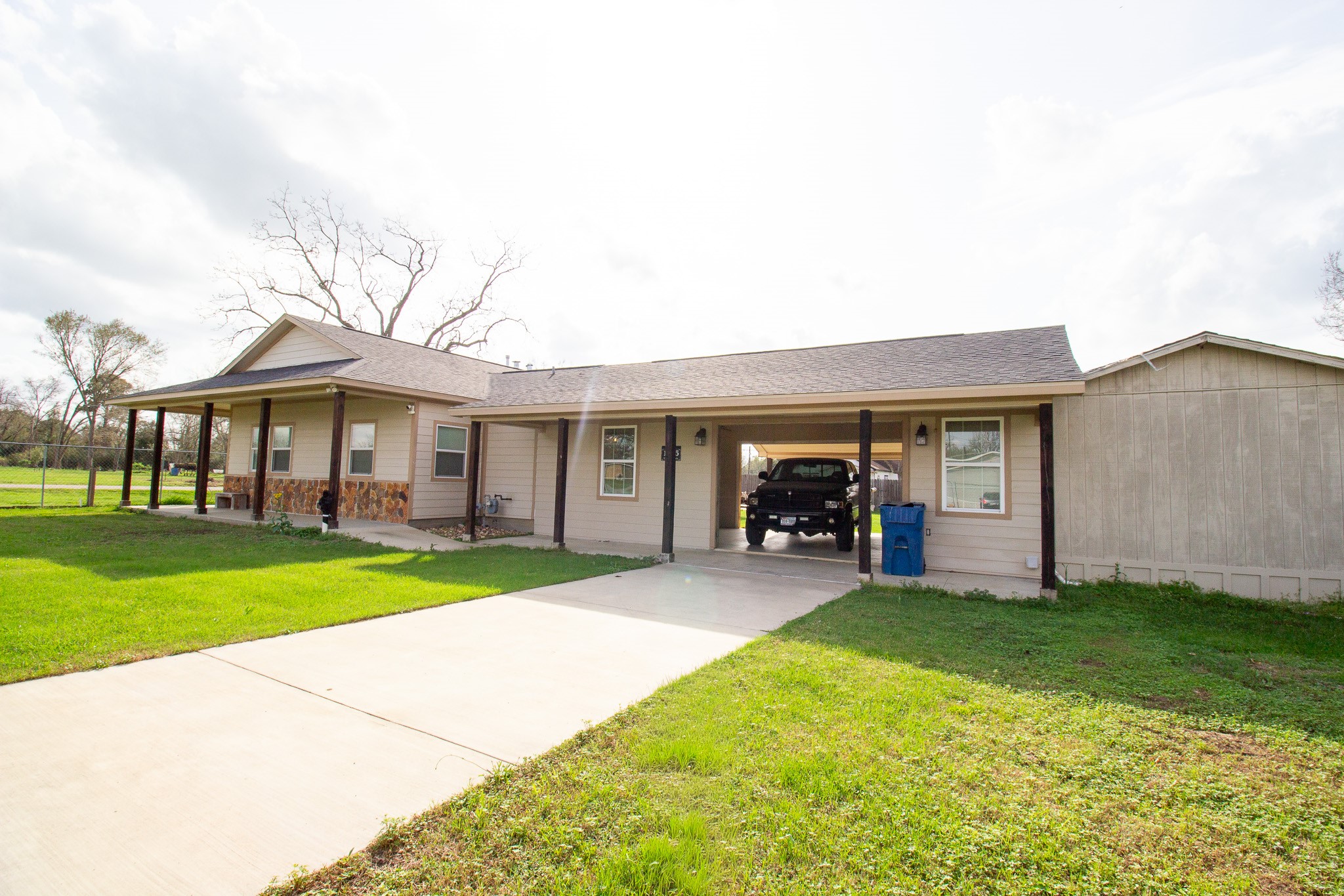 1245 4th Street Hempstead, TX 77445 - Photo 22 of 24 a view of a house with a yard and sitting area