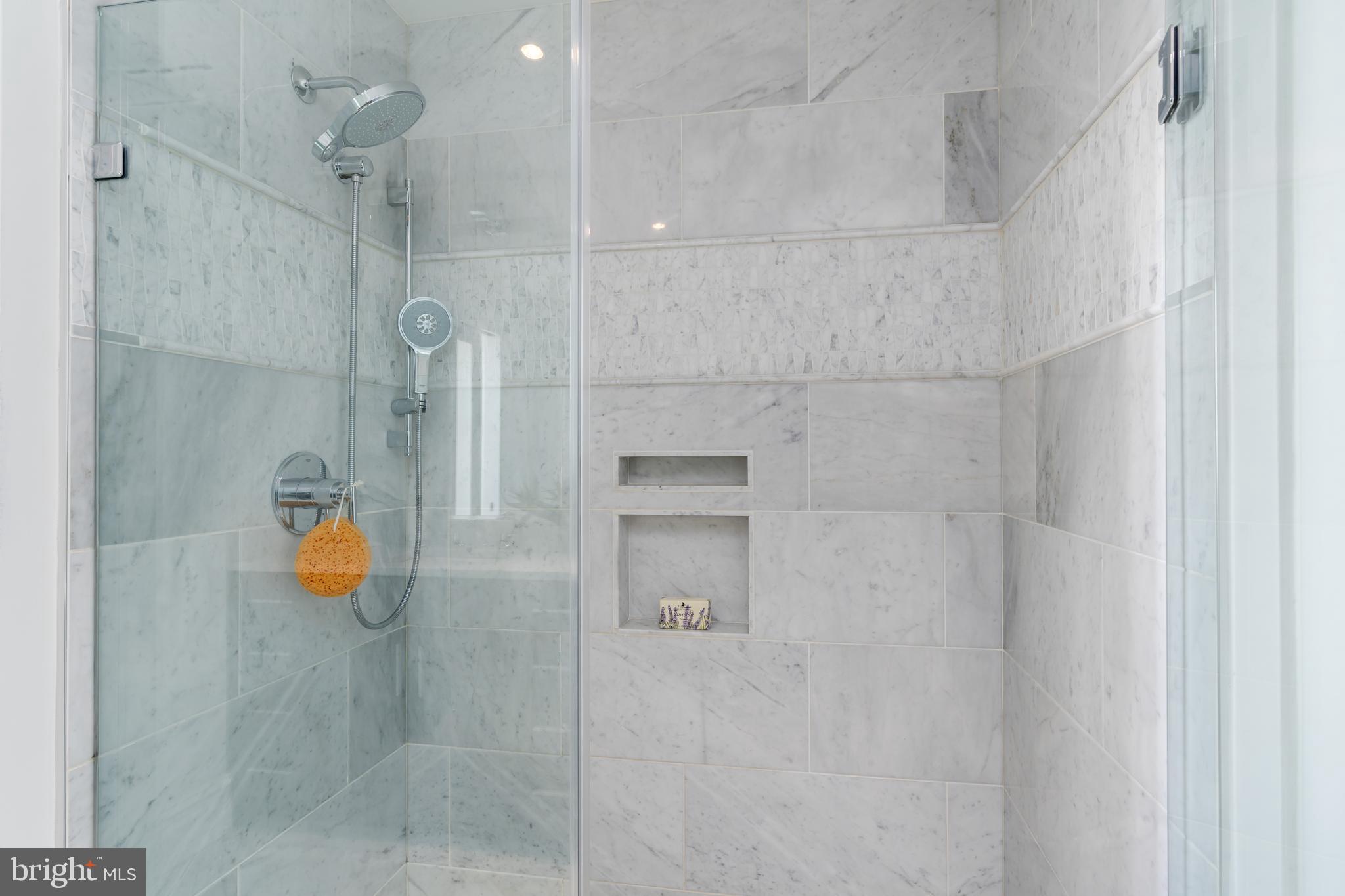 1801 16th Street Northwest, Unit 605 Washington, DC 20009 - Photo 24 of 38 Primary bath, marble tile
