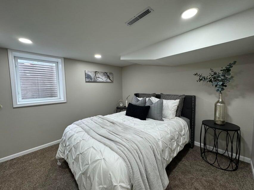 6910 Ash Avenue Gary, IN 46403 - Photo 18 of 27 a bedroom with bed and a window