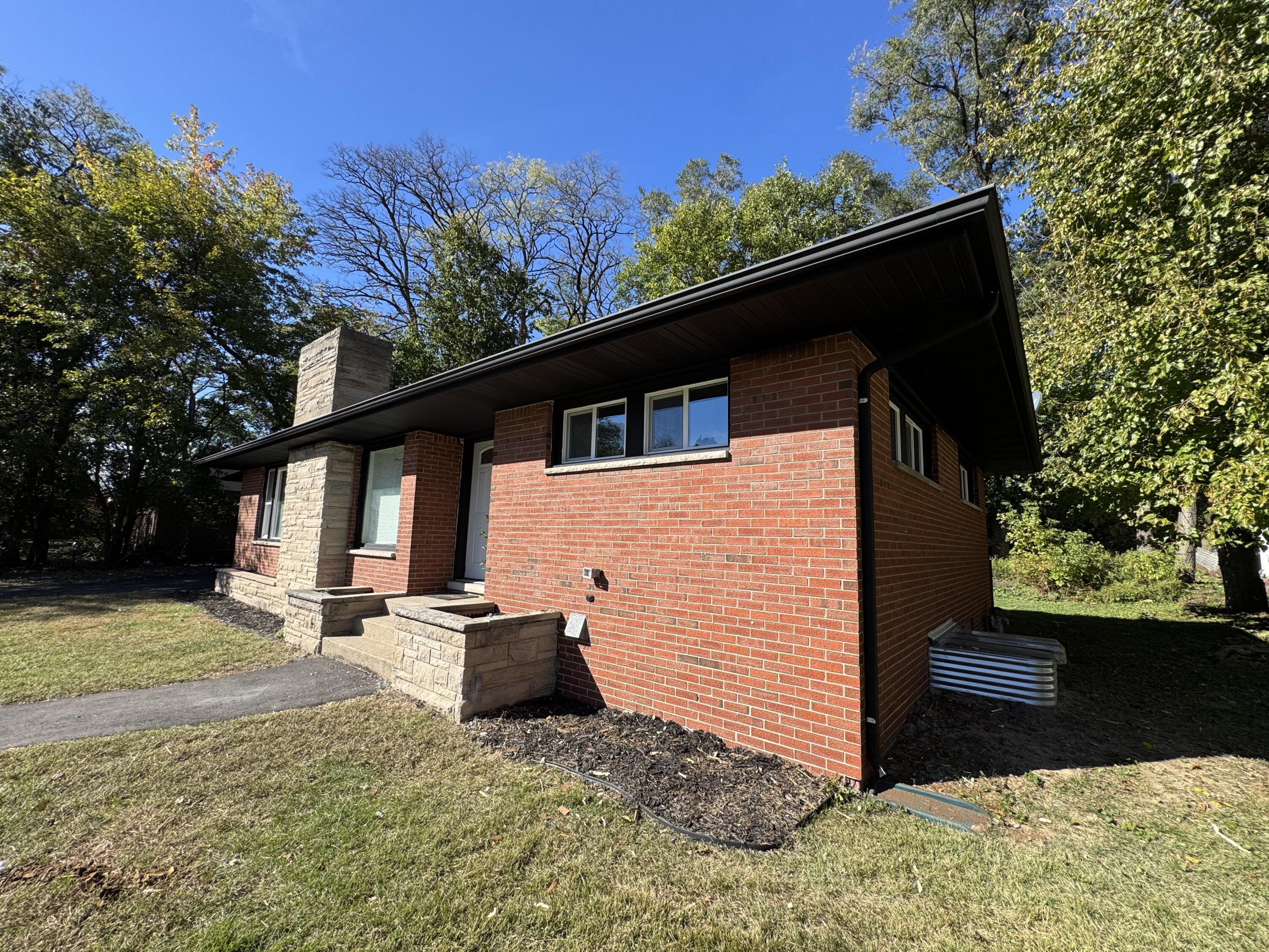 6910 Ash Avenue Gary, IN 46403 - Photo 23 of 27 a backyard of a house with table and chairs