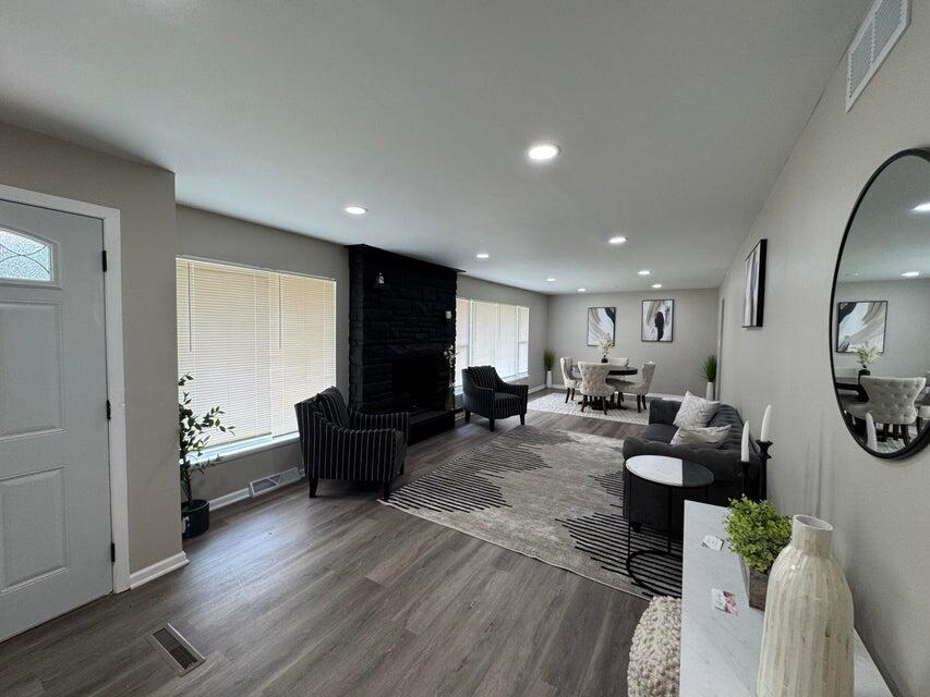 6910 Ash Avenue Gary, IN 46403 - Photo 4 of 27 a living room with furniture and a flat screen tv