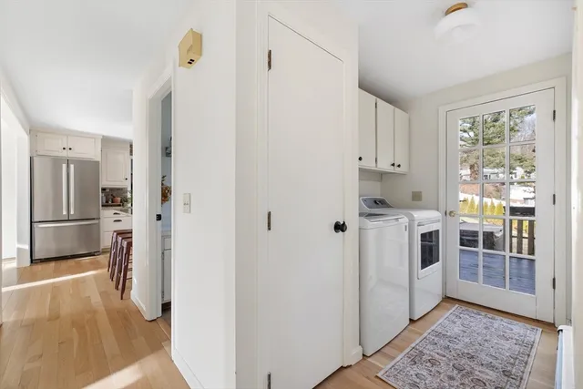 a kitchen with stainless steel appliances a refrigerator and a stove top oven