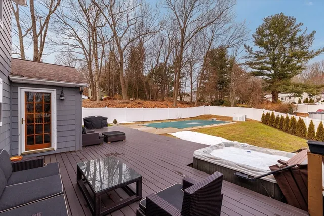 a view of a swimming pool with lounge chairs
